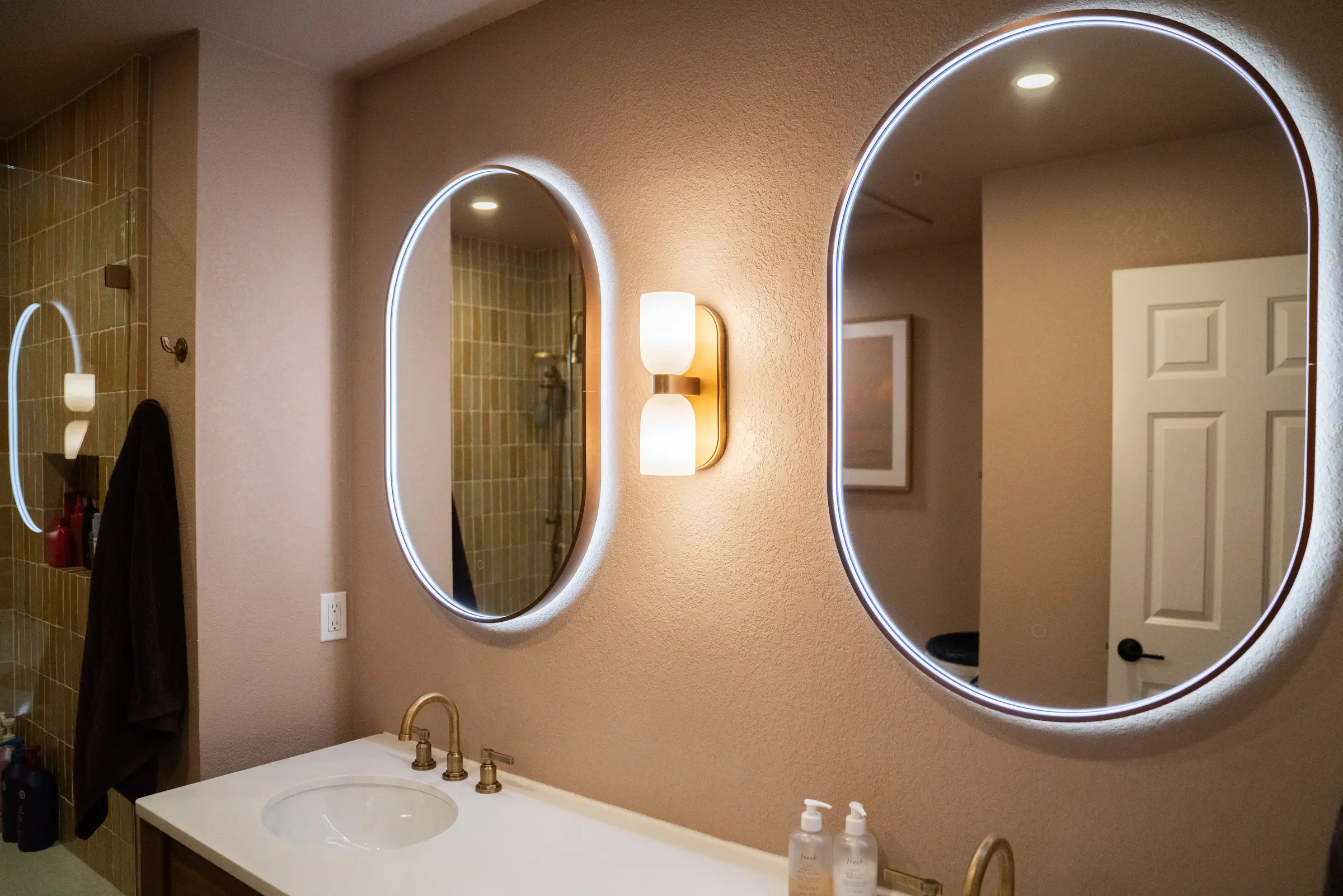 Bathroom finish details in a Boulder zellige tile remodel