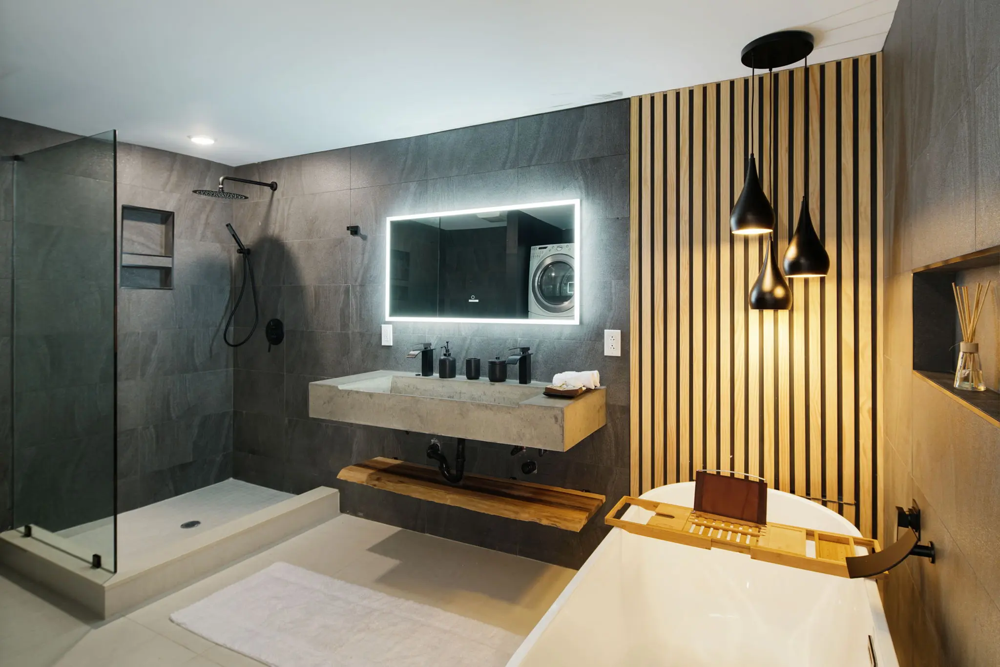 A paneled bathroom remodel with custom millwork and stone surfaces